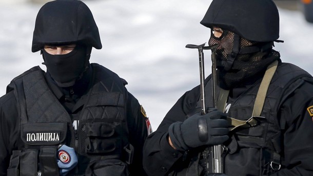 Police officers stand watch before Serbian Prime Minister Aleksandar Vucic's official visit to Banja Luka